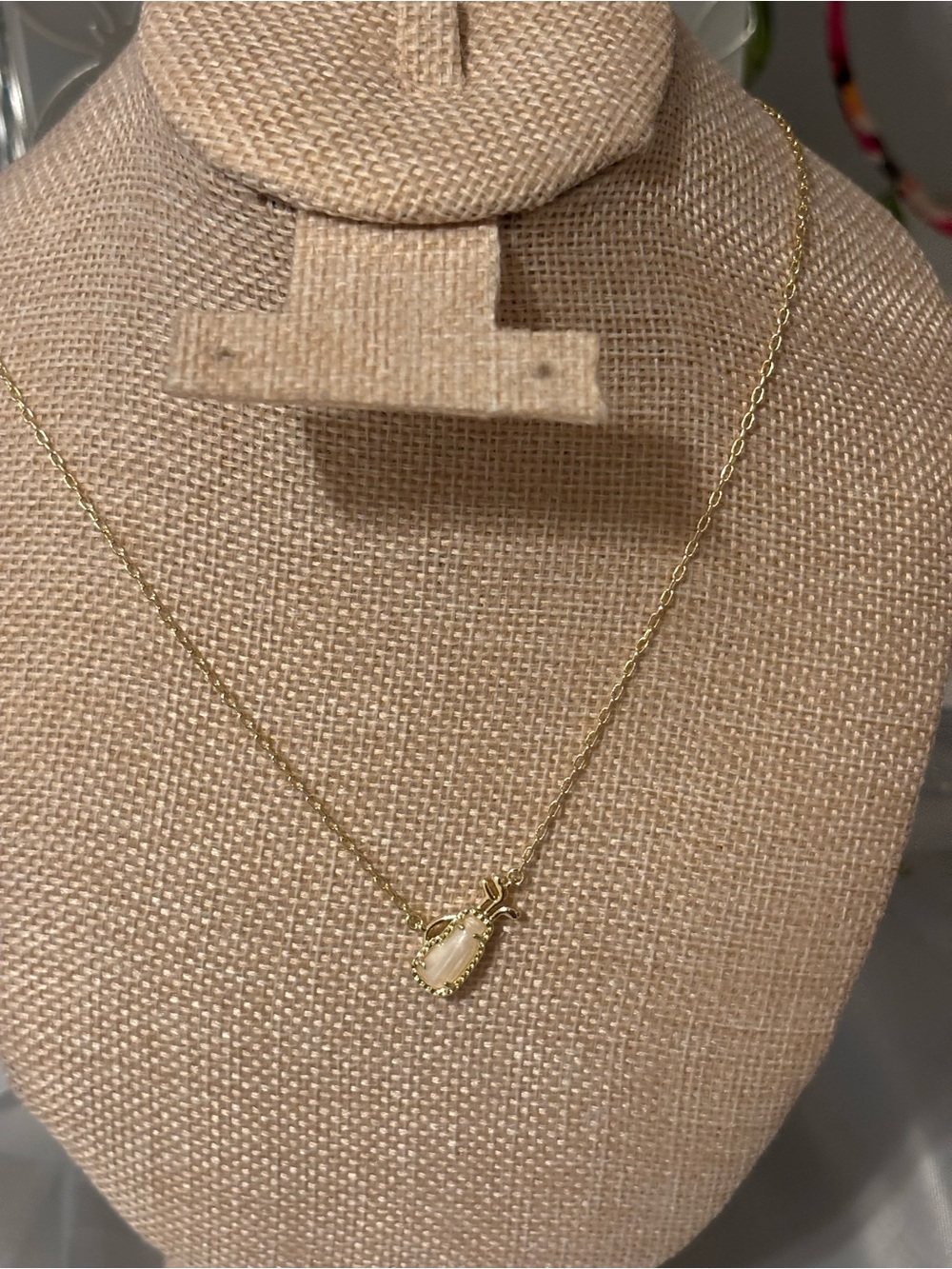 Delicate Gold Golf Club Pendant Necklace with Cream Stone